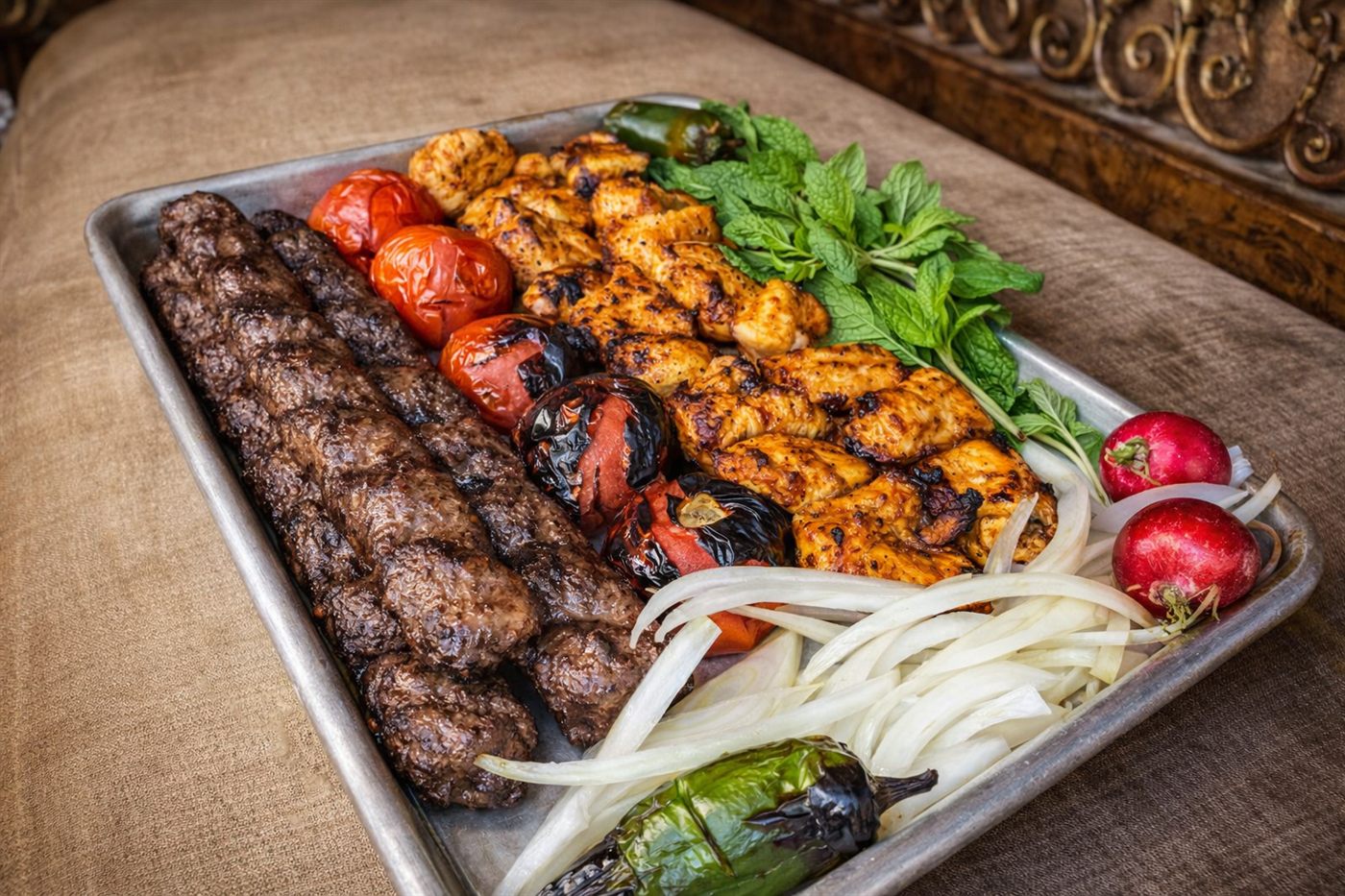 Catering trays of kebab and rice